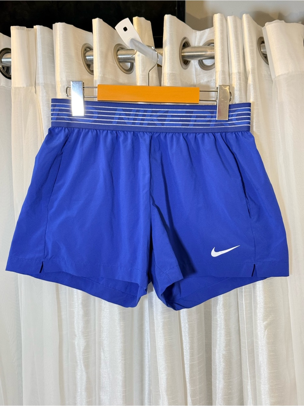 Nike Women's Royal Blue Athletic Shorts with Striped Waistband